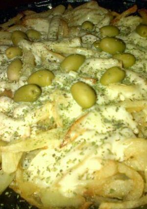 Una foto de Papas a la pizza