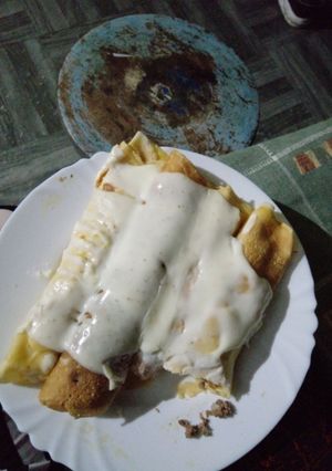 Una foto de Canelones De Carne Picada Y Bondiola