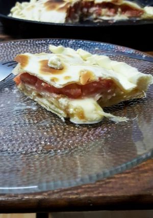 Una foto de Tarta de jamón, queso, cebolla y ricota