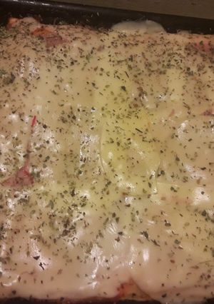 Una foto de Pizza de paleta y queso