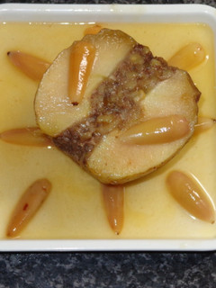 Una foto de Manzanas asadas rellenas con piñones