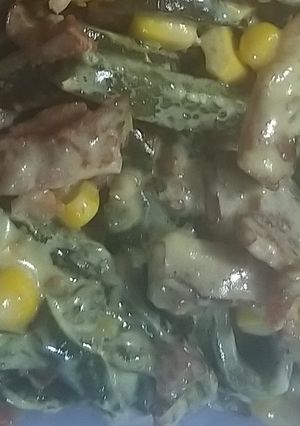 Una foto de Rajas con crema y tocino