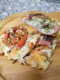Bread pizza with peperoni lemon chicken mushroom sauce