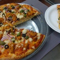 Chicken Tikka Pizza A picture of Chicken Tikka Pizza.