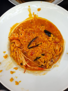 Una foto de Arroz caldoso de pescado 🦐