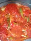 Bacalao con tomate y pimientos al horno