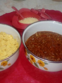Una foto de Tuco o salsa boloñesa con corbatitas al huevo