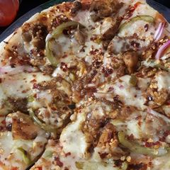 Chicken tikka pizza/burst cheese pizza A picture of Chicken tikka pizza/burst cheese pizza.