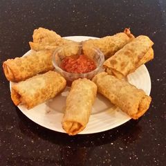 A picture of Chicken Parmesan Eggrolls.
