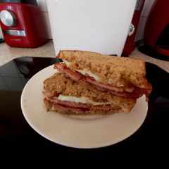 A picture of My Lovely Bacon and fried Egg Toasted Sandwich 🥰.