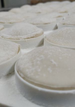 Una foto de Sorrentinos de jamón y mozzarella