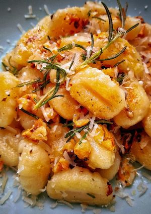 A picture of Pan Fried Gnocchi With Crispy Garlic, Toasted Walnuts & Rosemary.