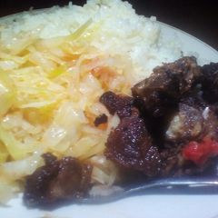 A picture of Fried beef,rice and cabbage.