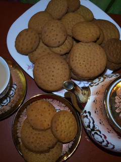 A picture of Homemade Ginger Digestive biscuits with tea masala.