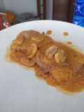 Redondo de ternera en salsa con champiñones