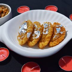 A picture of Semolina Walnut Gujiya.