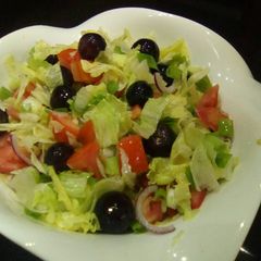 A picture of Greek salad (minus feta cheese).