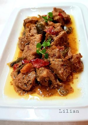 A picture of Pork Sauté with Wine and Peppers.
