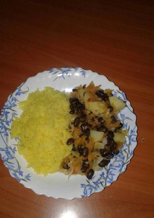 A picture of Black Njahi with Tumeric rice.
