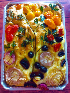 A picture of Artistic Focaccio Bread with Rosemary.