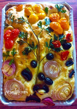 A picture of Artistic Focaccio Bread with Rosemary.