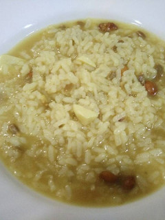 Una foto de Arroz caldoso con ajos, pipas y cacahuetes