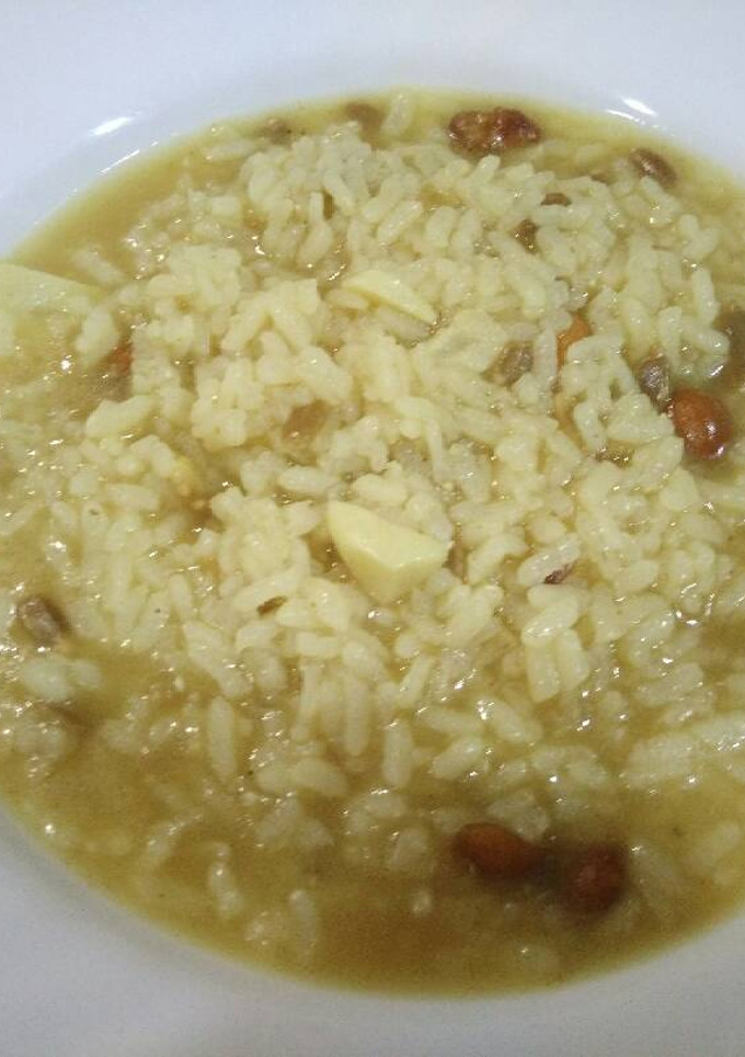 Una foto de Arroz caldoso con ajos, pipas y cacahuetes
