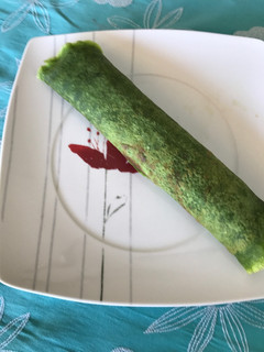 Una foto de Panqueques de espinaca rellenos