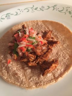 A picture of Shredded MOlé Chicken Tacos.