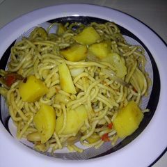 A picture of Fried spaghetti and potato.