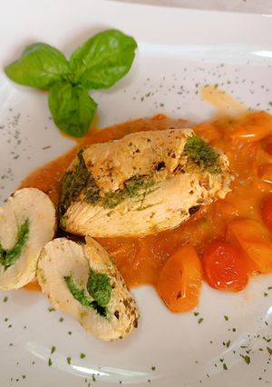 A picture of Chicken Breast Roll-Ups with Swiss Chard and Parmesan Cream.