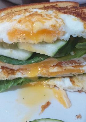 A picture of Egg in a hole sandwich.
