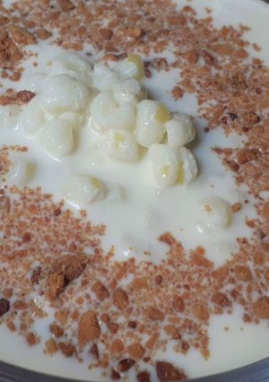 Una foto de Canjica Cremosa de Milho com Amendoim.Recetas Tradicionales de Brasil