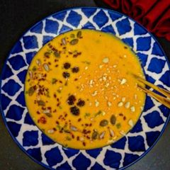 Mango Smoothie Bowl With Nuts And Mix Seeds A picture of Mango Smoothie Bowl With Nuts And Mix Seeds.