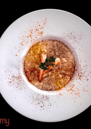 A picture of Five-Spice Risotto with Cognac Sautéed Shrimp.