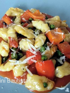 Una foto de Ñoquis con verduras
