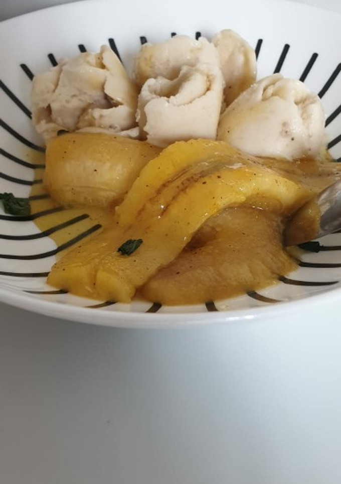 Una foto de Plátanos en salsa de naranja