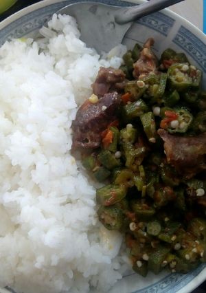 A picture of Rice served with beef Okra.