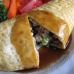 A picture of Oyster Sauce Omu-rice (Omelette Rice).