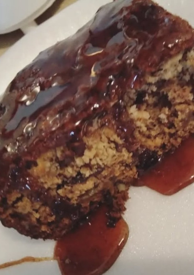 A picture of Banana-Nut Bread with Spiced Maple Syrup.