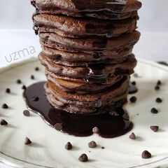 A picture of Eggless Chocolate and Choco chips Pancakes.