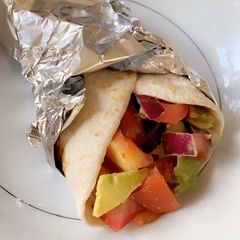 A picture of Garlic and lemon prawn wraps.