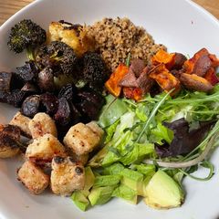 A picture of Buddha bowl with roasted veg and crispy tofu.