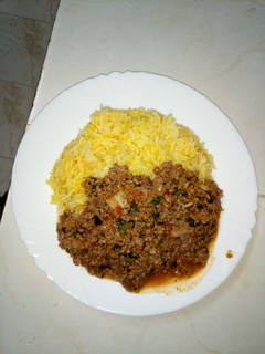 A picture of Carrot rice and spicy ground beef.