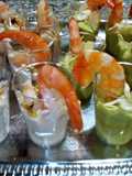 Code di gambero su crema di cannellini al brandy,e crema di avocado agli agrumi