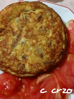 Una foto de Tortilla de salmón con setas