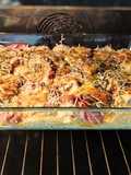 Potato Gratin with Raclette Cheese, Ham, and Onions