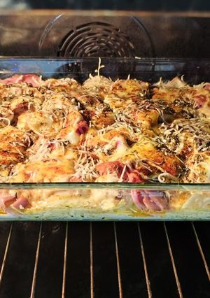 A picture of Potato Gratin with Raclette Cheese, Ham, and Onions.