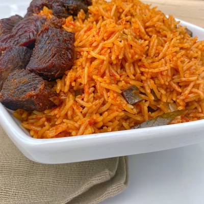 Smokey party jollof rice Recipe by Cookingwithseki - Cookpad