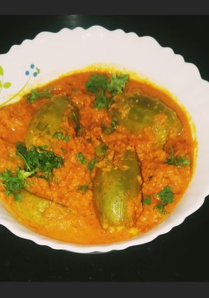 A picture of Striped pear gourd or Pointed Gourd(parval) Curry.